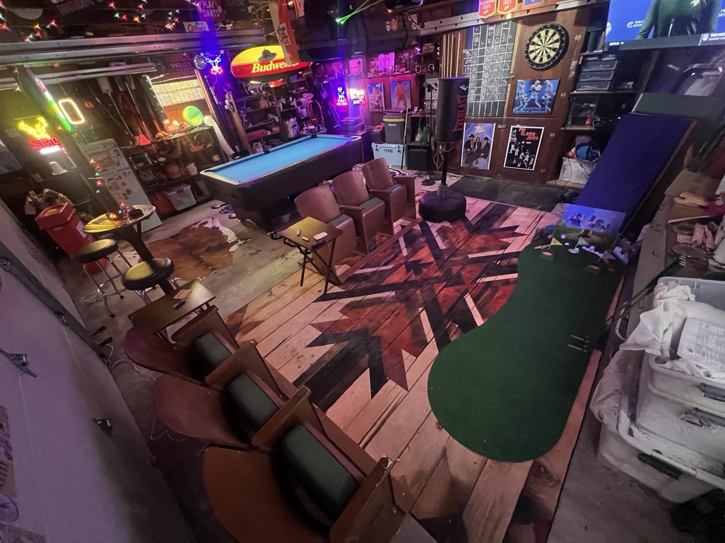 Original garage interior showing pool, seating and putting